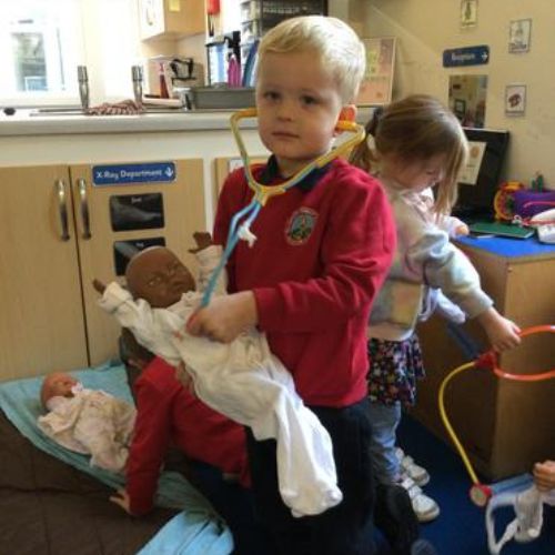 Caring for others and having aspirations in the role play hospital!