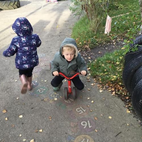 Developing our gross motor skills outside, is lots of fun!